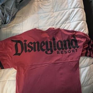 Used excellent condition authentic red Disneyland spirit jersey